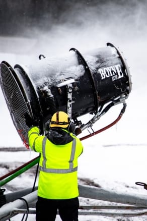 A Highlands employee snowmaking